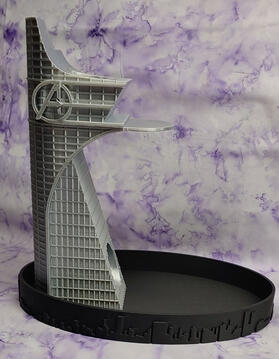 MTH 2024 Auction win; Avengers dice tower in silver with black cityscape base.