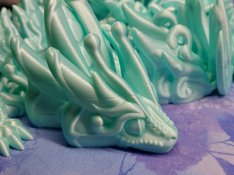 Butterfly dragon in silk cyan